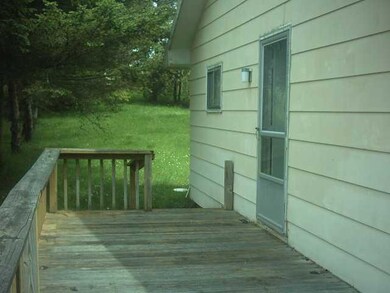 Exterior Front Side deck by kitchen door