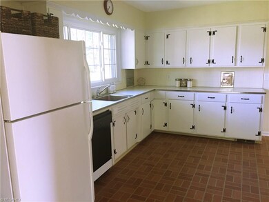 SPACIOUS KITCHEN WITH A NEW PICTURE WINDOW & WHITE