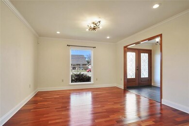 Formal Living area has Brazilian cherry flooring a