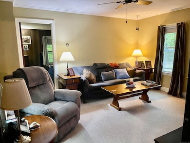 Comfortable main level Living room with doorway to Bedroom