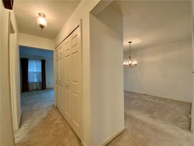 View looking into the dining room and living room.