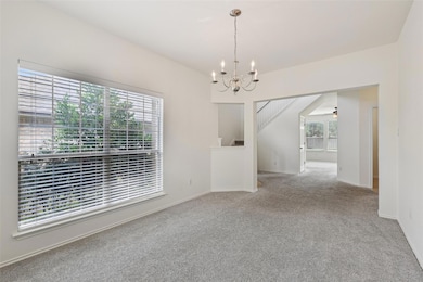Unfurnished room with carpet floors, plenty of na