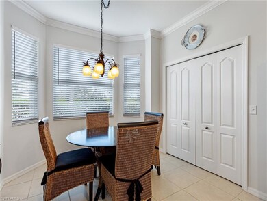 Living area featuring light tile patterned floors,