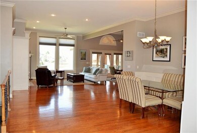 Open concept home with hardwoods throughout main a