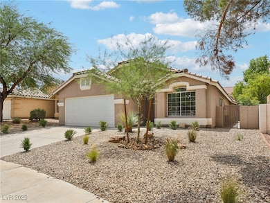 View of front facade featuring concrete driveway,