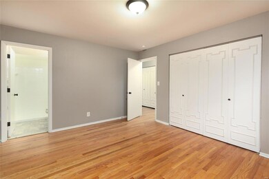 Large Master Bedroom, also with Gleaming Wood Floors and includes a Master Bath and plenty of Closet space.