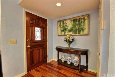 Entryway with guest closet