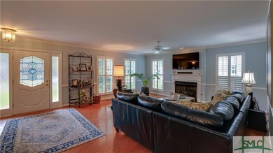 LIghtfilled great room with gas fireplace.