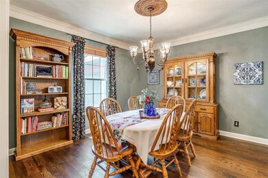 The formal dining includes decorative chandelier a