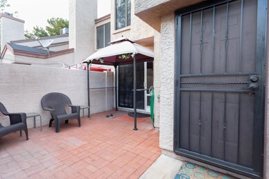 Front Door w Paved Courtyard Area