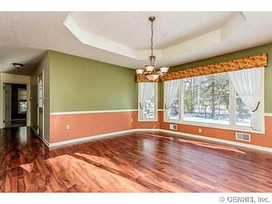 Dining Room Large picture window makes this a brig