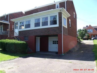 Exterior Back. Nice enclosed rear porch