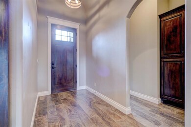 Entrance foyer featuring light hardwood / wood-sty
