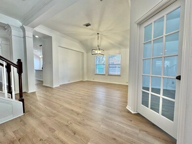 Another view of the foyer and stairs that lead to game room/ media room and half bath in the second floor. Neutral colors all throughout this beautiful home and with a lot of natural lighting makes everything flow smoothly.