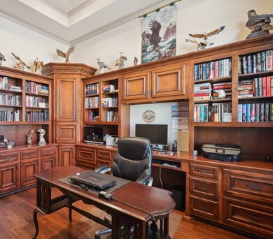 Library shelving continuously on 2 walls