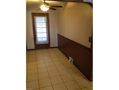 Directly off the living room is the dining area. H