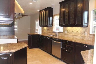 REMODELED SOLID OAK KITCHEN CABINETS ACCENTED WITH