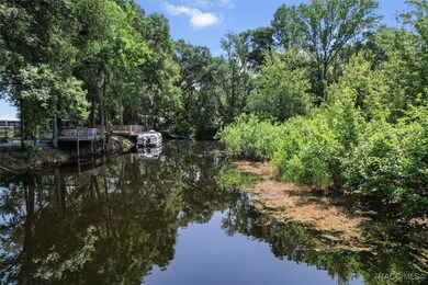 Canal in back yard take you to Lake Henderson
