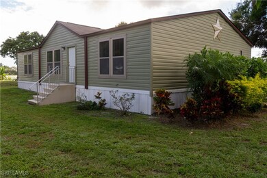 View of front of house featuring a front yard