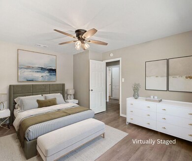 Bedroom featuring wood finished floors and a ceil