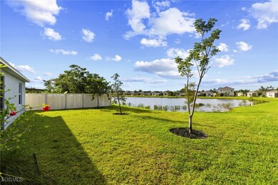 View of yard with a water view