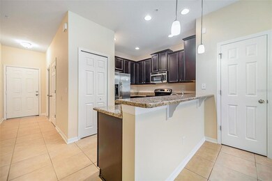 Front-door view with 1/2 bath door adjacent, Kitch
