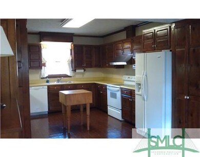Kitchen. Spacious kitchen is loaded with custom bu