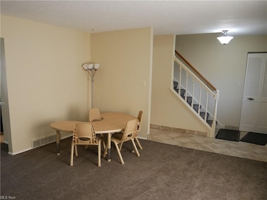 Foyer has ceramic tile floor.
