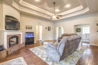 Spacious living with high ceilings, gas log firepl
