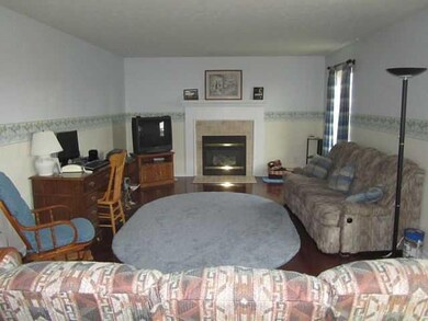 Family Room. The family room features a gas firepl