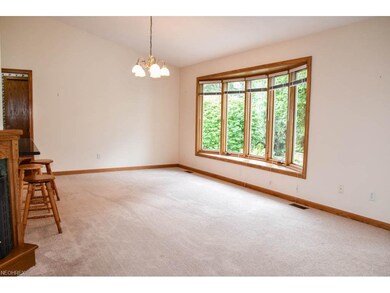 Dining room with a bay window.