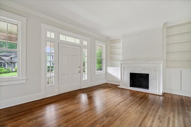 Interior space featuring ornamental molding and da