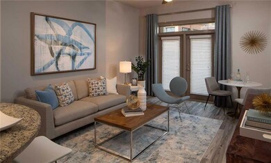 Living room with hardwood / wood-style floors