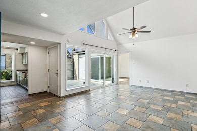 Bright Living Area with Vaulted Ceiling