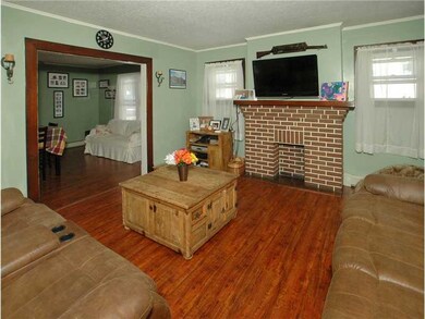 Living Room. Beautiful decorative fireplace.