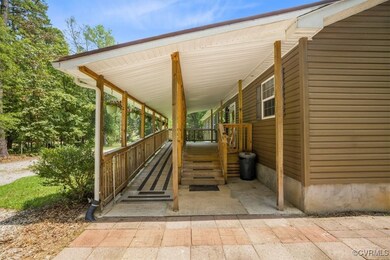 View of patio with covered porch