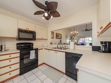 Kitchen featuring sink, black appliances, kitchen