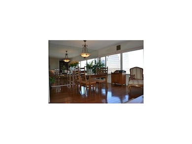 Dining area as was furnished. Note mirrored wall f