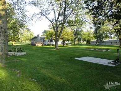 Firepit, gardening boxes, slab for shed