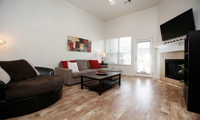 The ideally situated corner fireplace offers gaslo