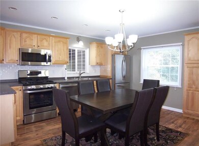 Updated maple kitchen with lots of counter space.