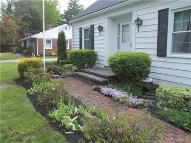 Exterior Front. Recently landscaped walkway to fro