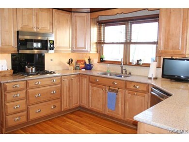 Raised Panel Maple Cabinets & Quartz Countertop