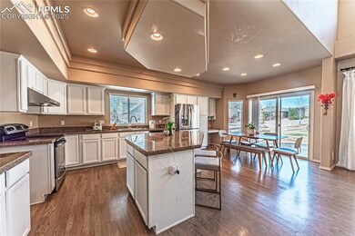 Kitchen featuring a center island, under cabinet r