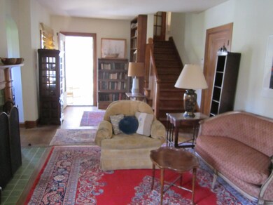 3 LIVING ROOM TOWARDS PORCH