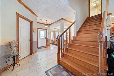 Beautiful hardwood staircase that leads up to the
