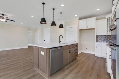 Photos are of a similar home