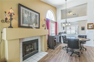 Dining area with wood finished floors, plenty of n