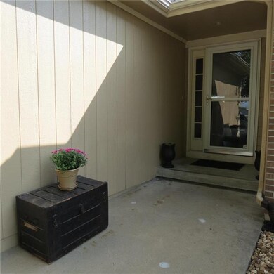 Front porch is covered for guests coming to visit.