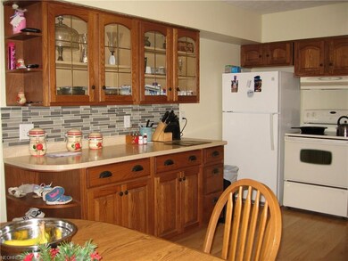Kitchen with table space area, Corian counters and